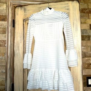 White long sleeve dress.